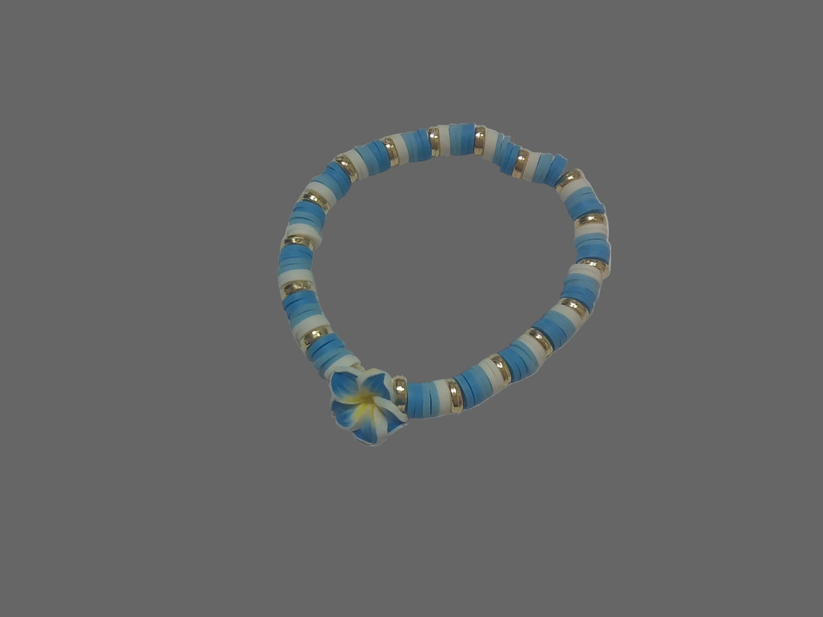 Clay beaded bracelet with gold spacers